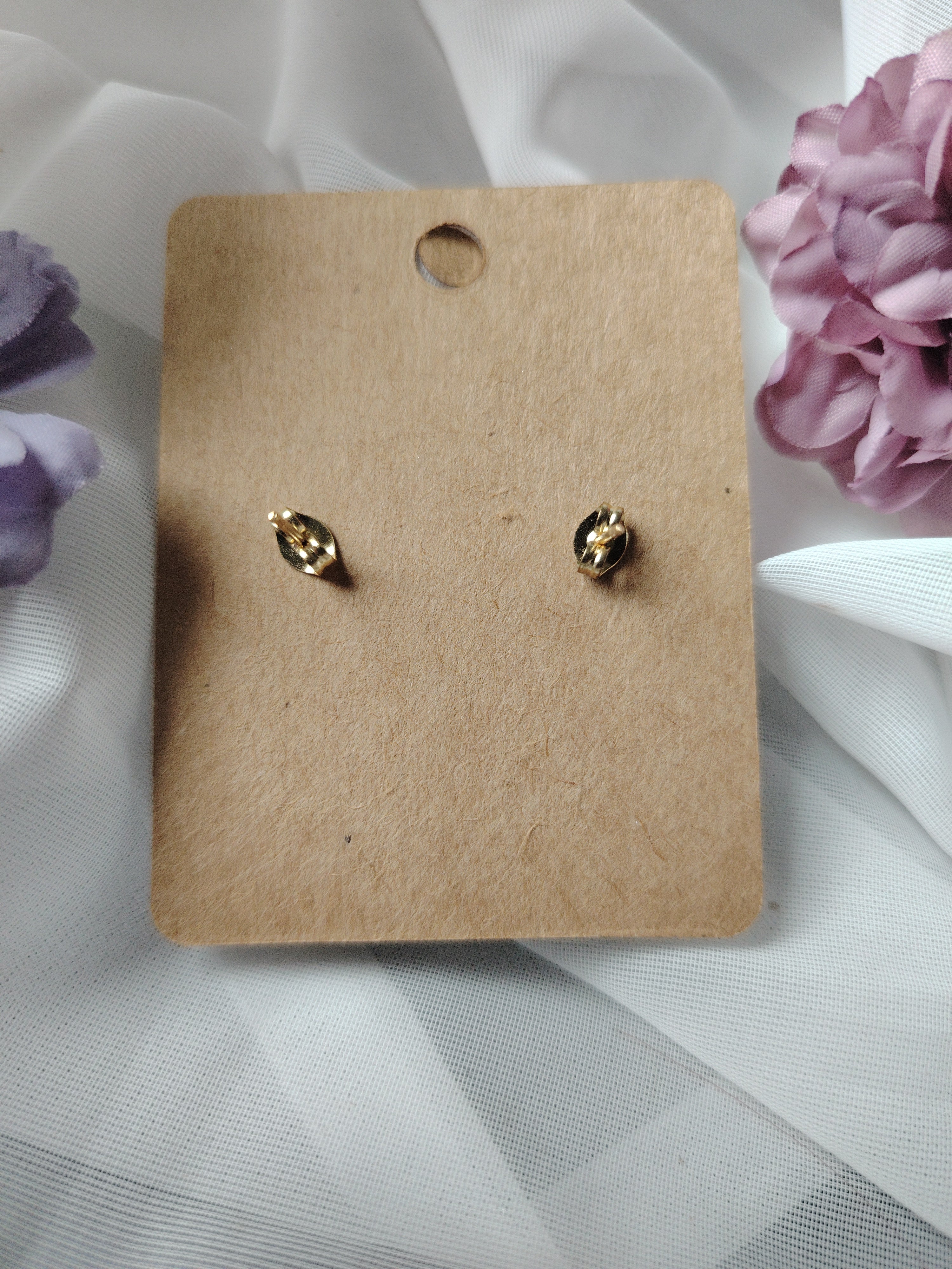 Oorbellen met kleine en grote parels in de kleuren grijs, crème, zilver, goudtinten