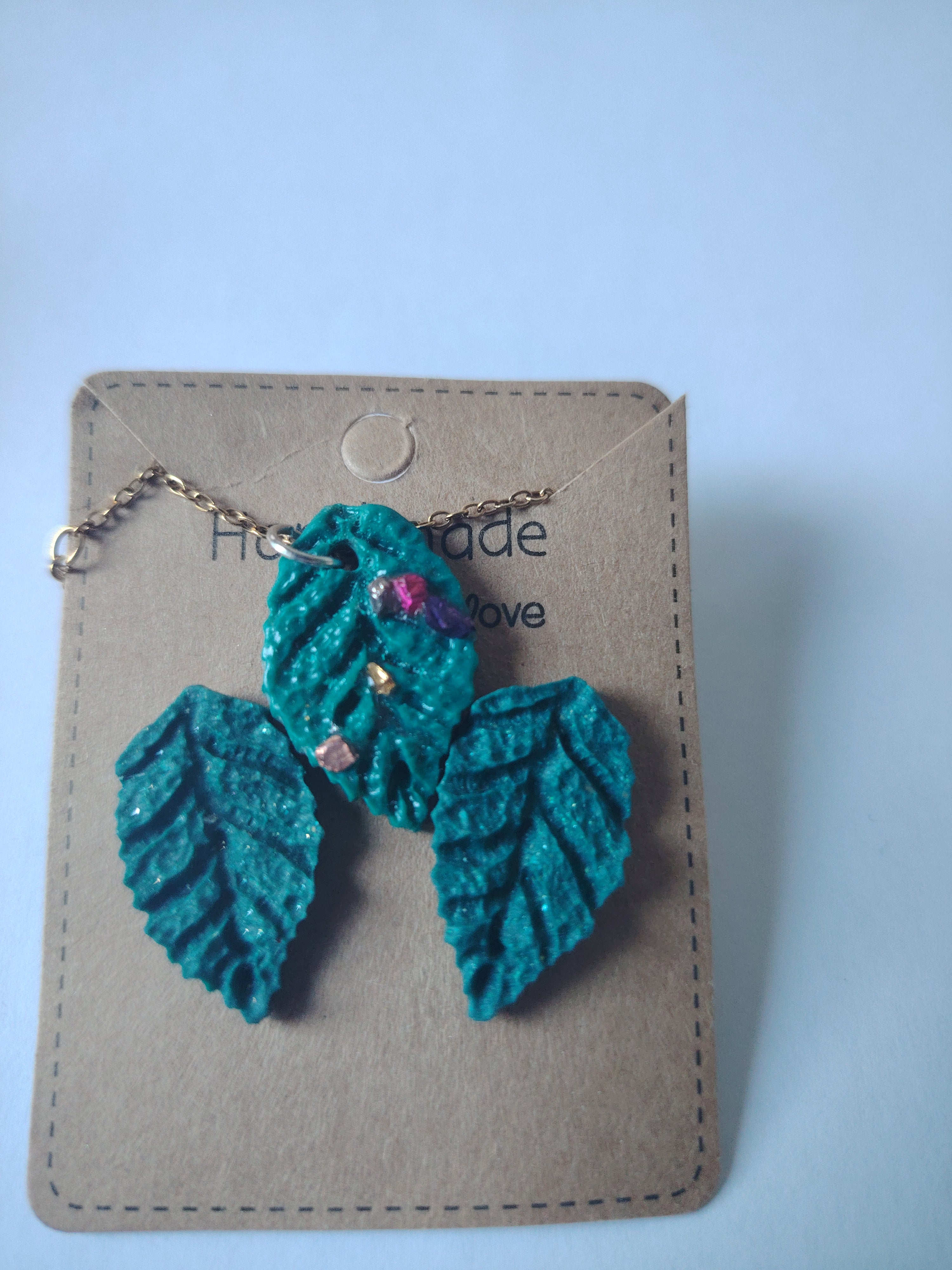 Earring and necklace set in green, necklace with small colorful stones