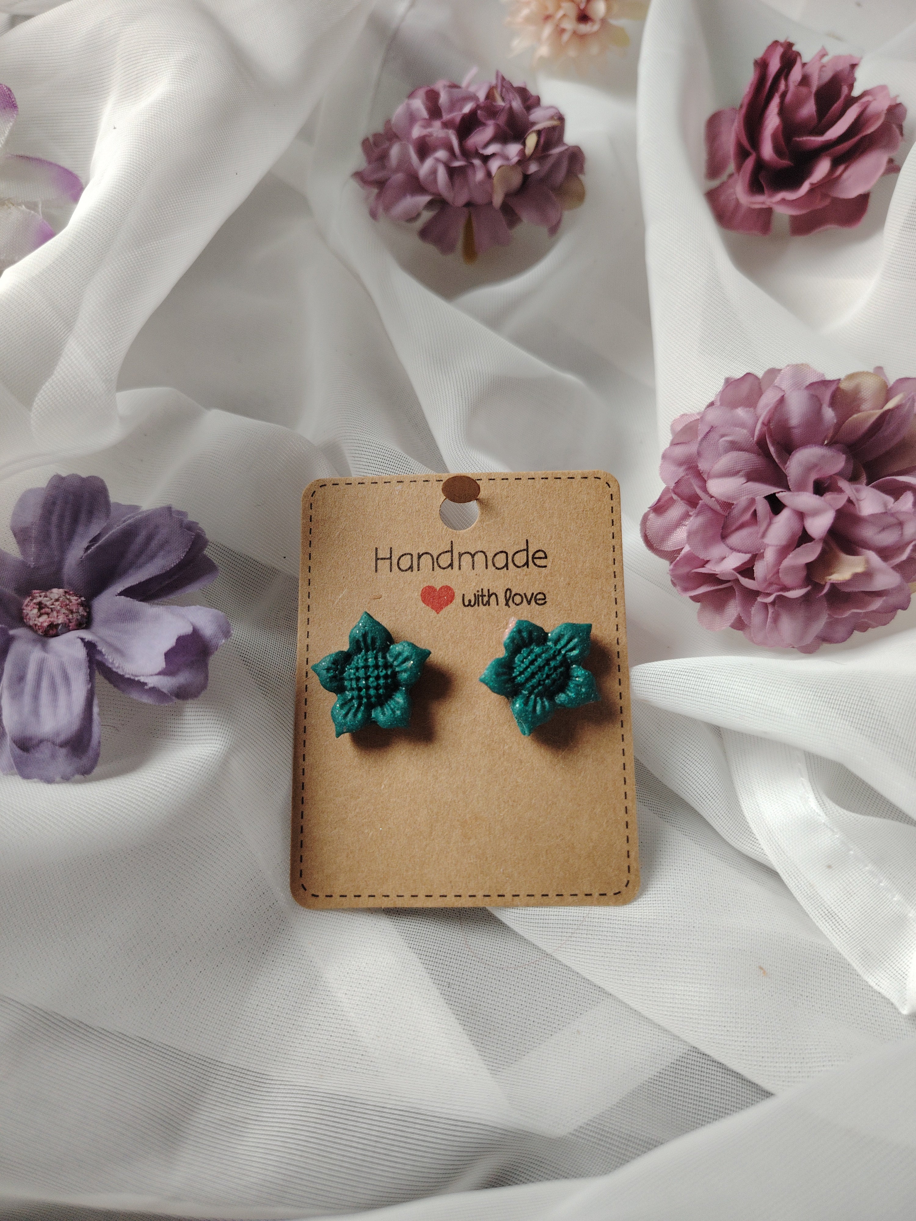 Floral earrings in green and pink glitter