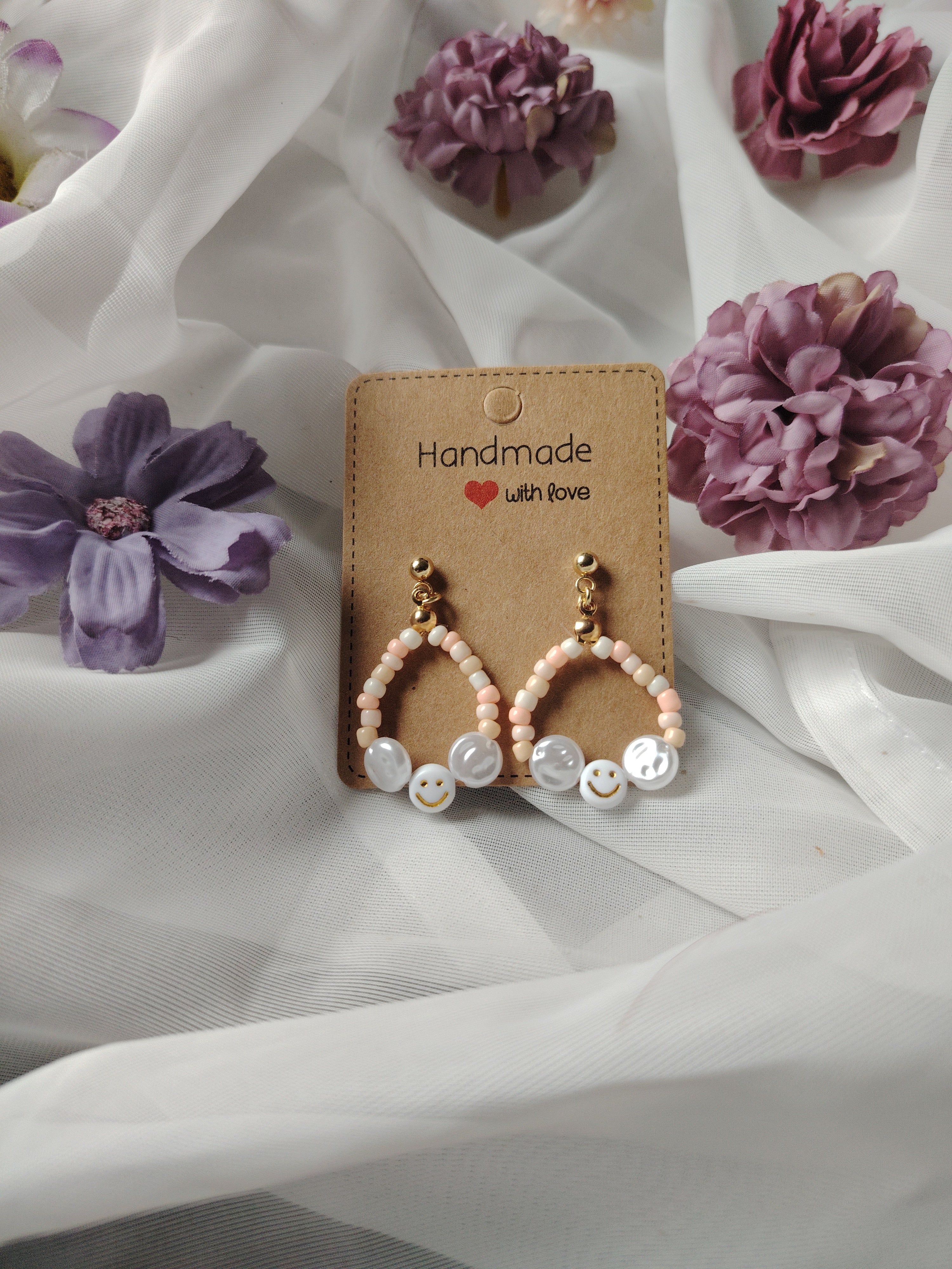 Earrings with small and large pearls in the colors white, pink, cream, white silver, smile