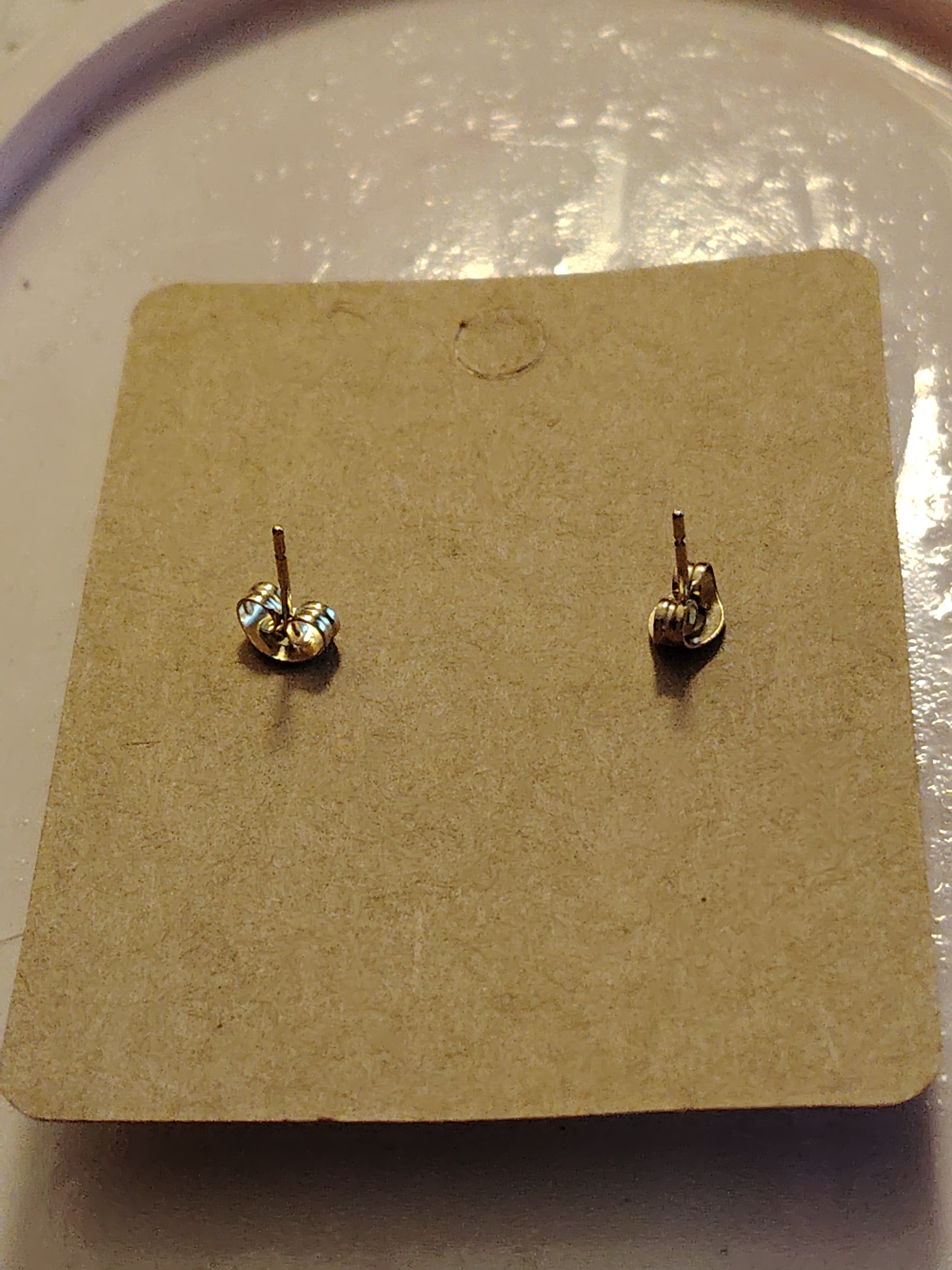 Floral earrings in green and pink glitter