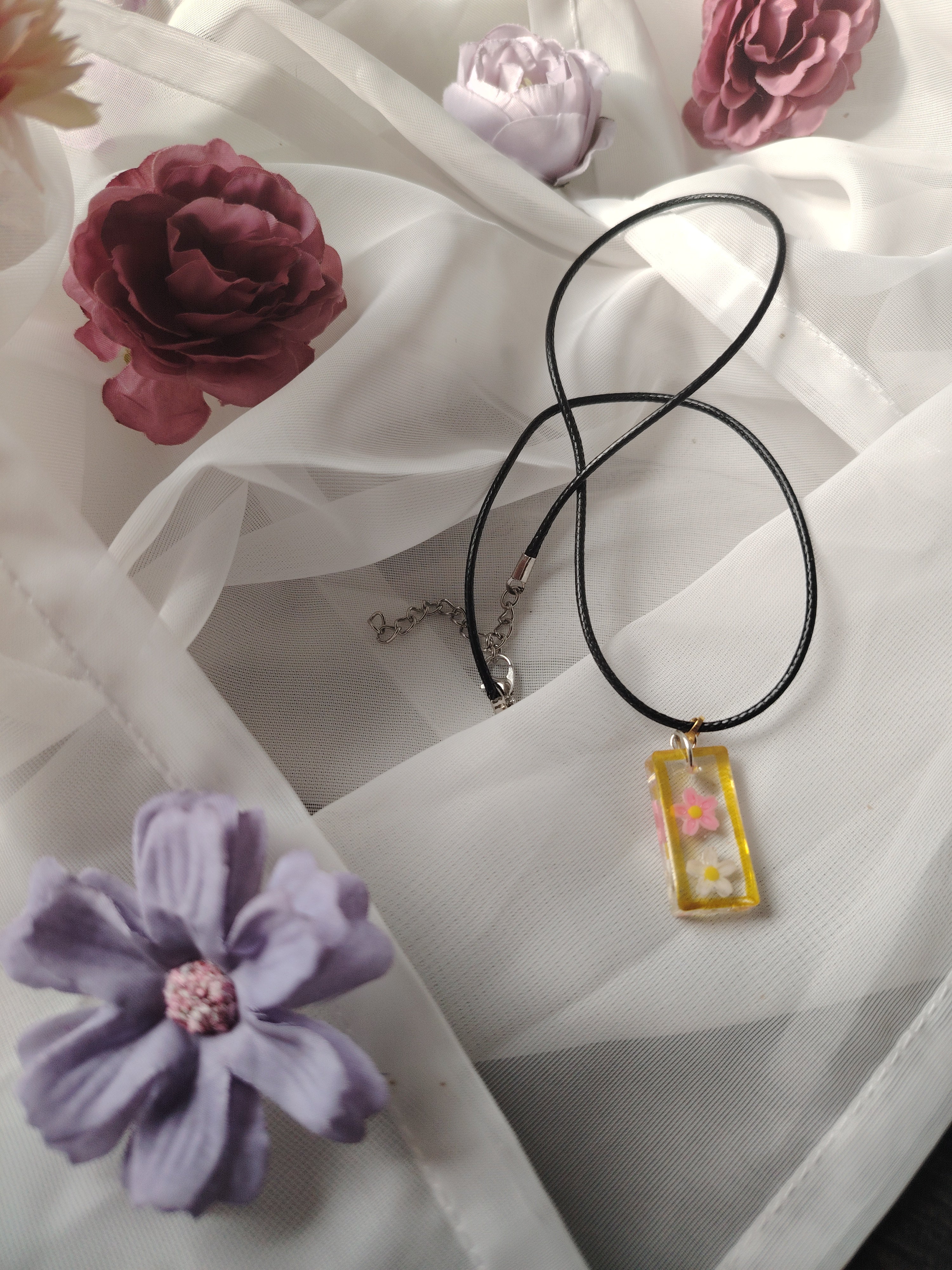 UV resin necklace pendant with flowers and black necklace