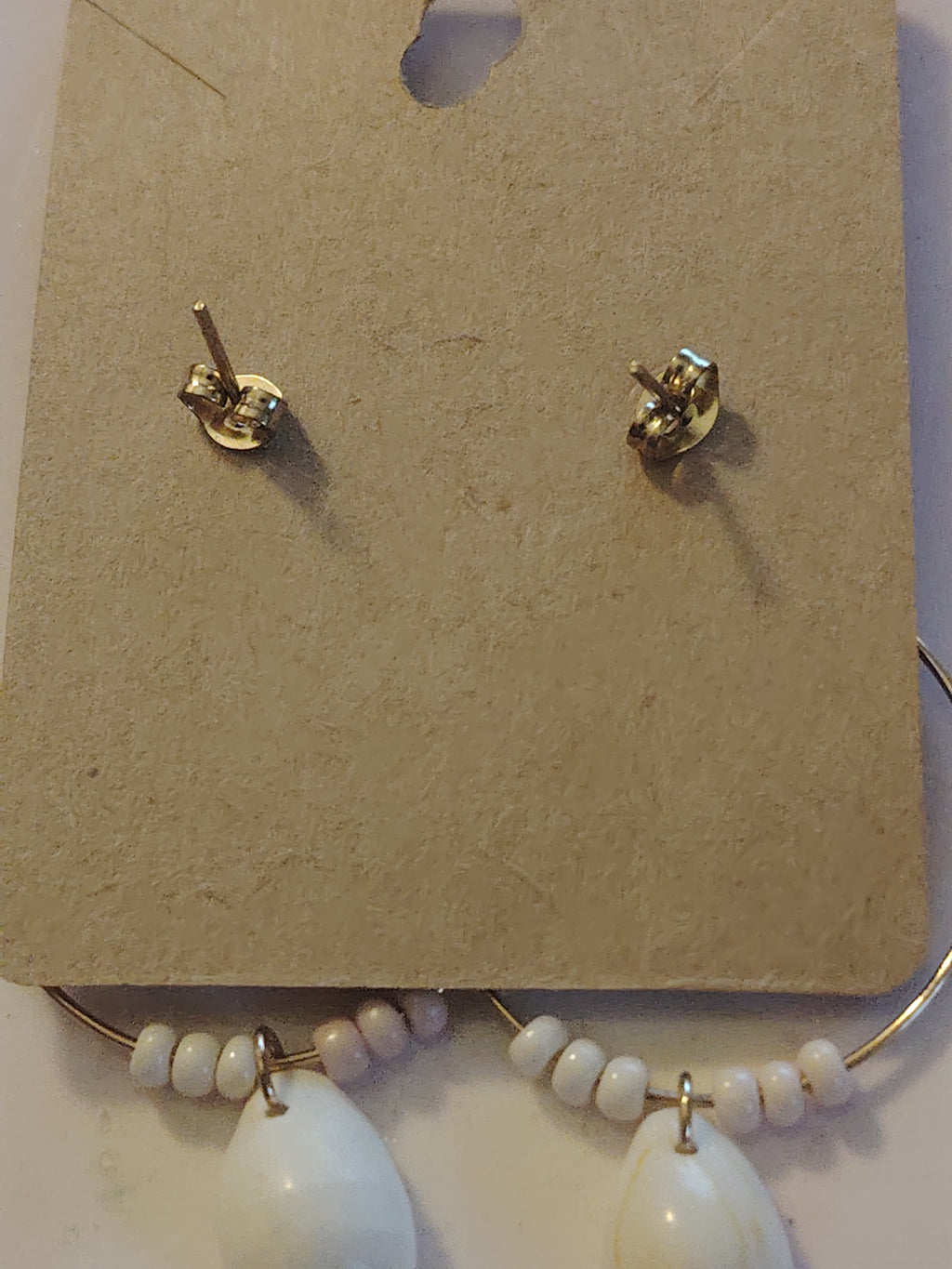 Hoop earrings with small pearls and cream-white shells