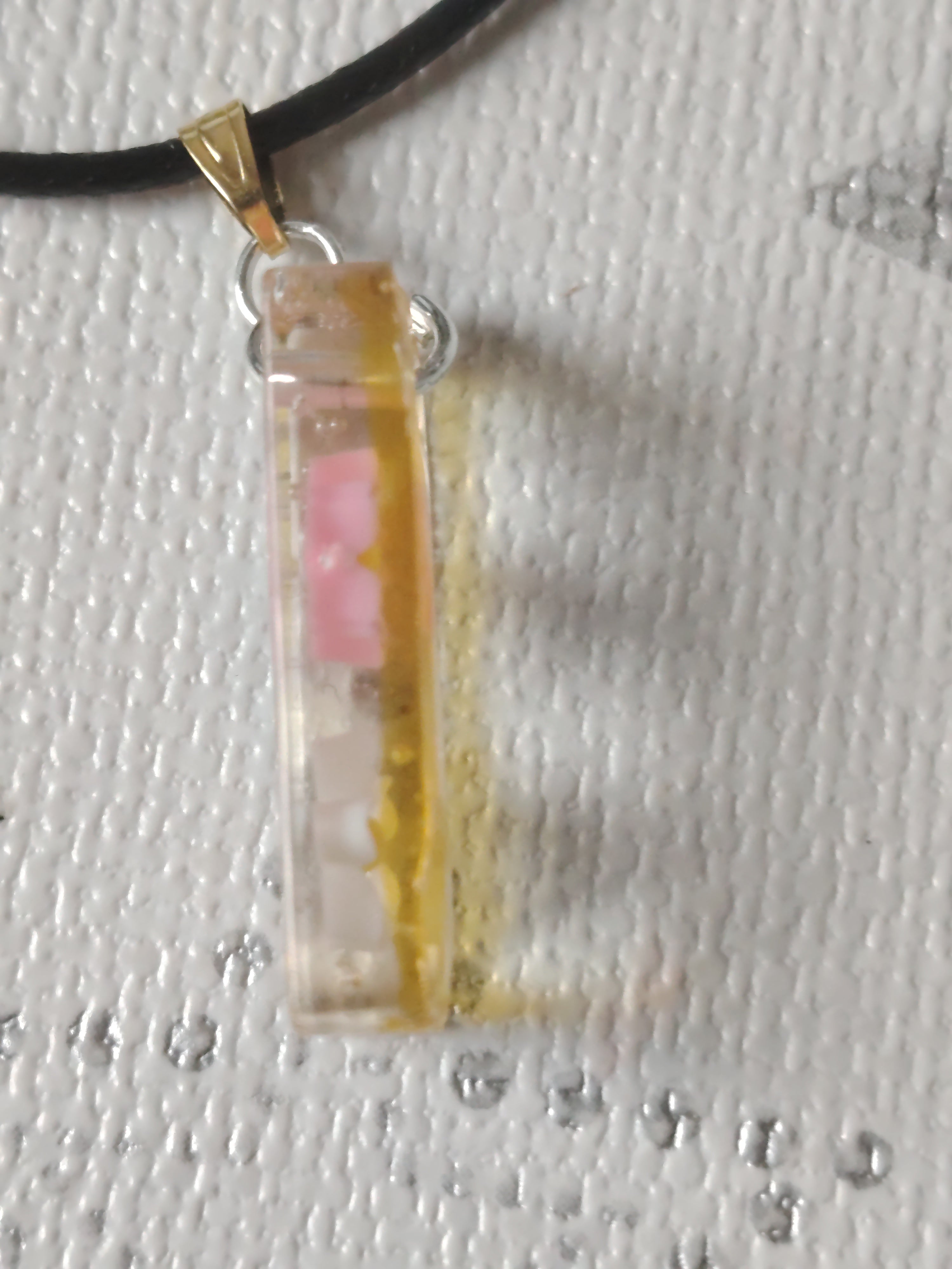 UV resin necklace pendant with flowers and black necklace