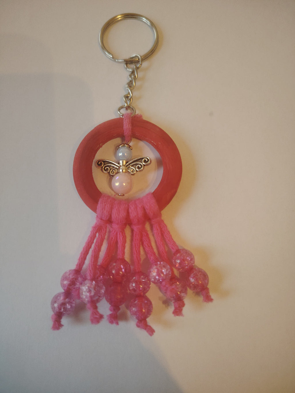 Schlüsselanhänger in Pink mit kleinen Schutzengel