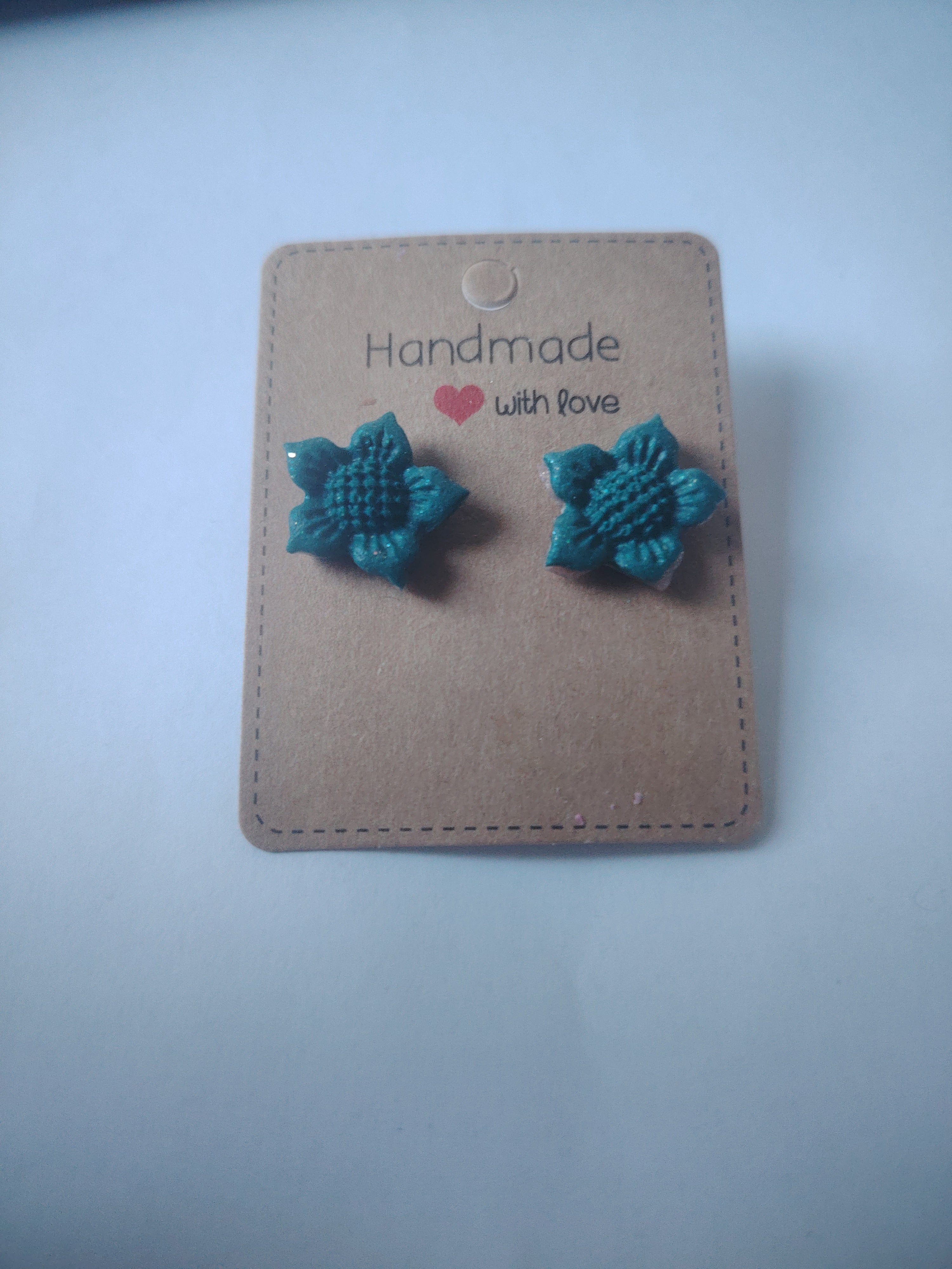 Floral earrings in green and pink glitter