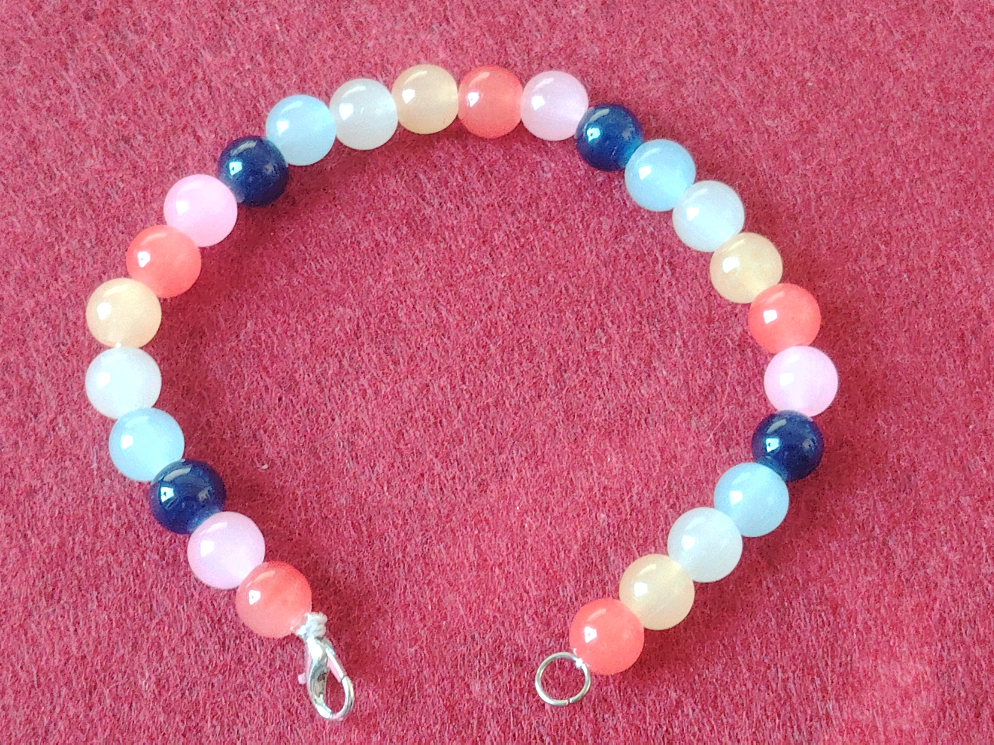 Glaskugel Armband mit den Farben, Orange , helles Gelb, Weiß, Hellem Blau, Dunkles Blau, Rosa