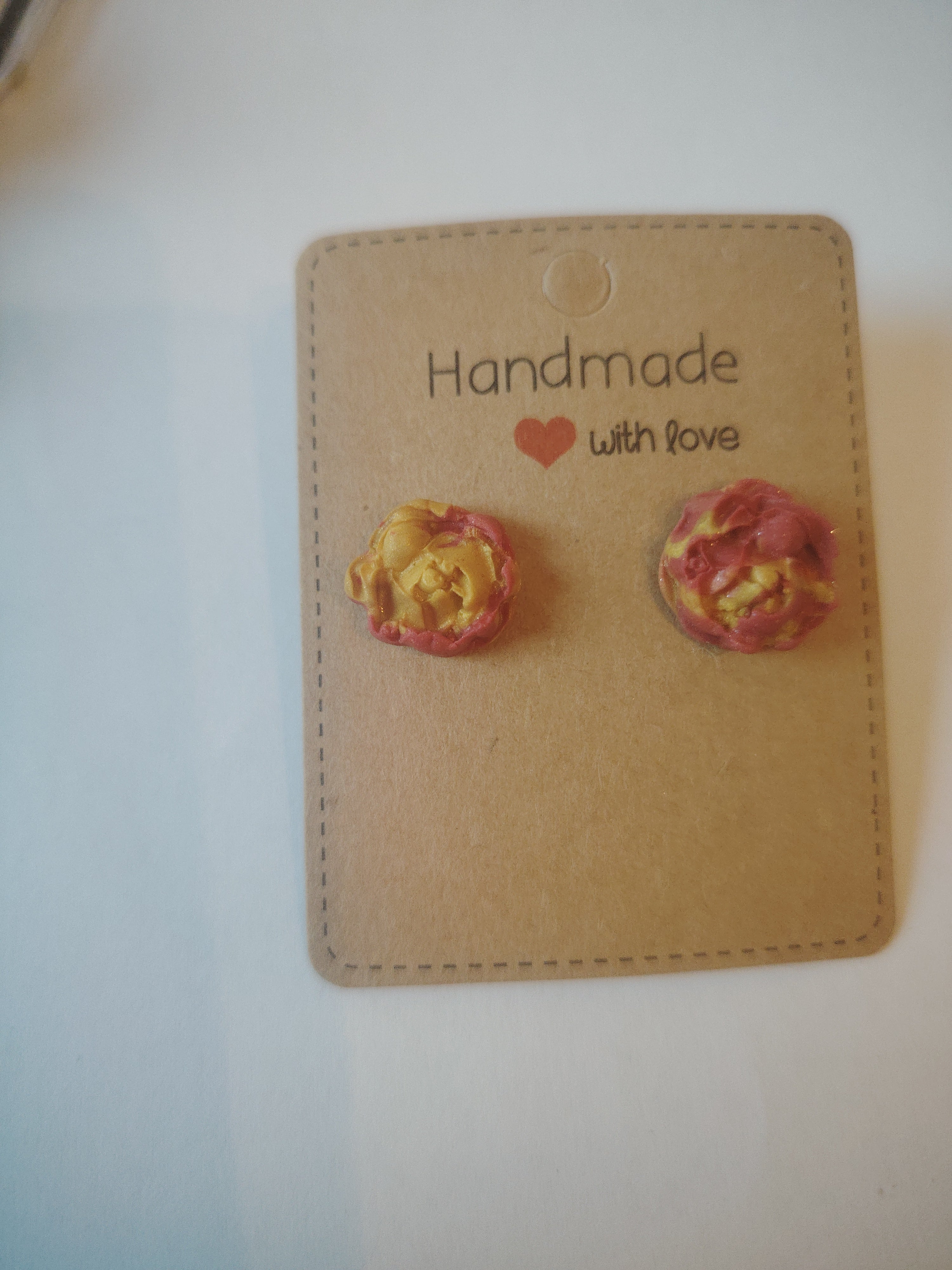 Medium-sized red and gold glitter rose stud earrings