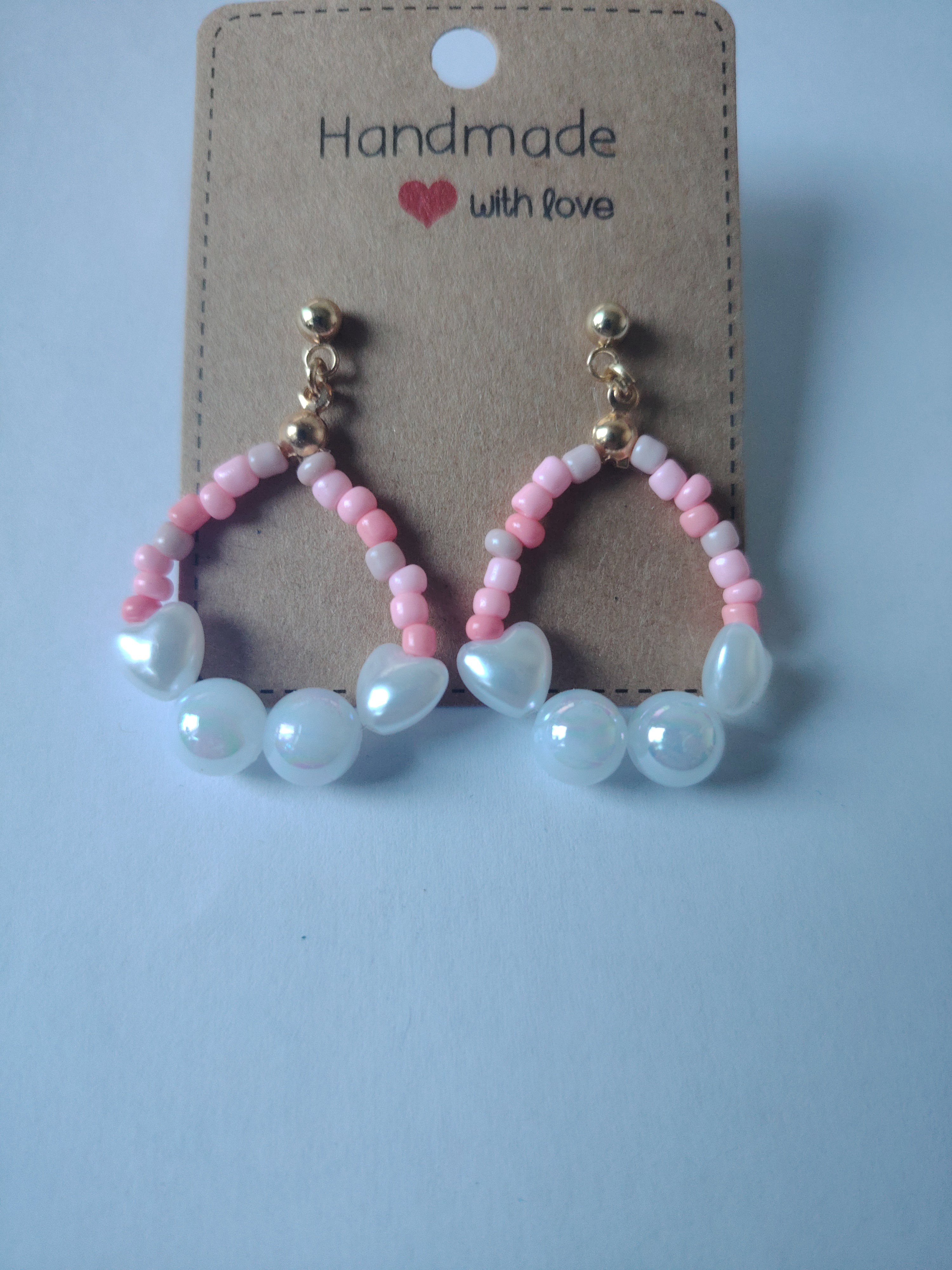 Oorbellen met kleine en grote parels in de kleuren roze, koraal, oudroze, wit zilver