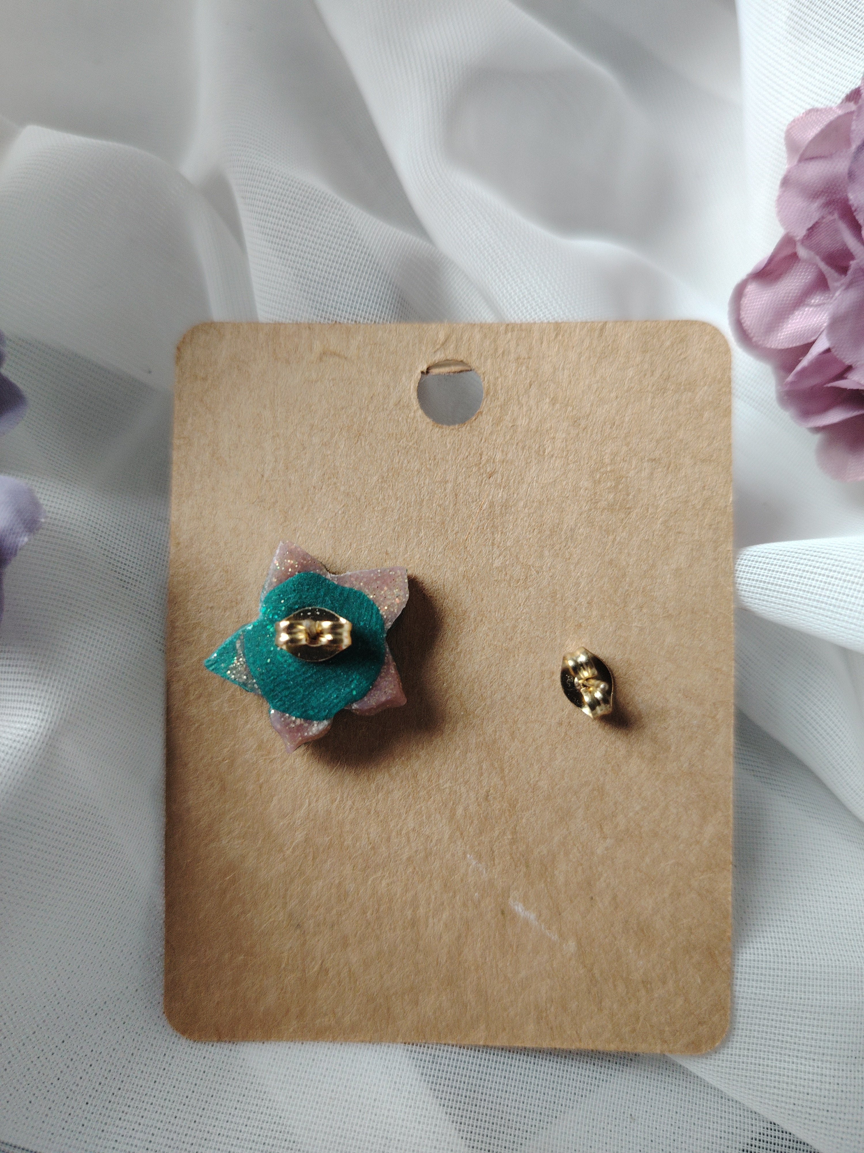 Floral earrings in green and pink glitter
