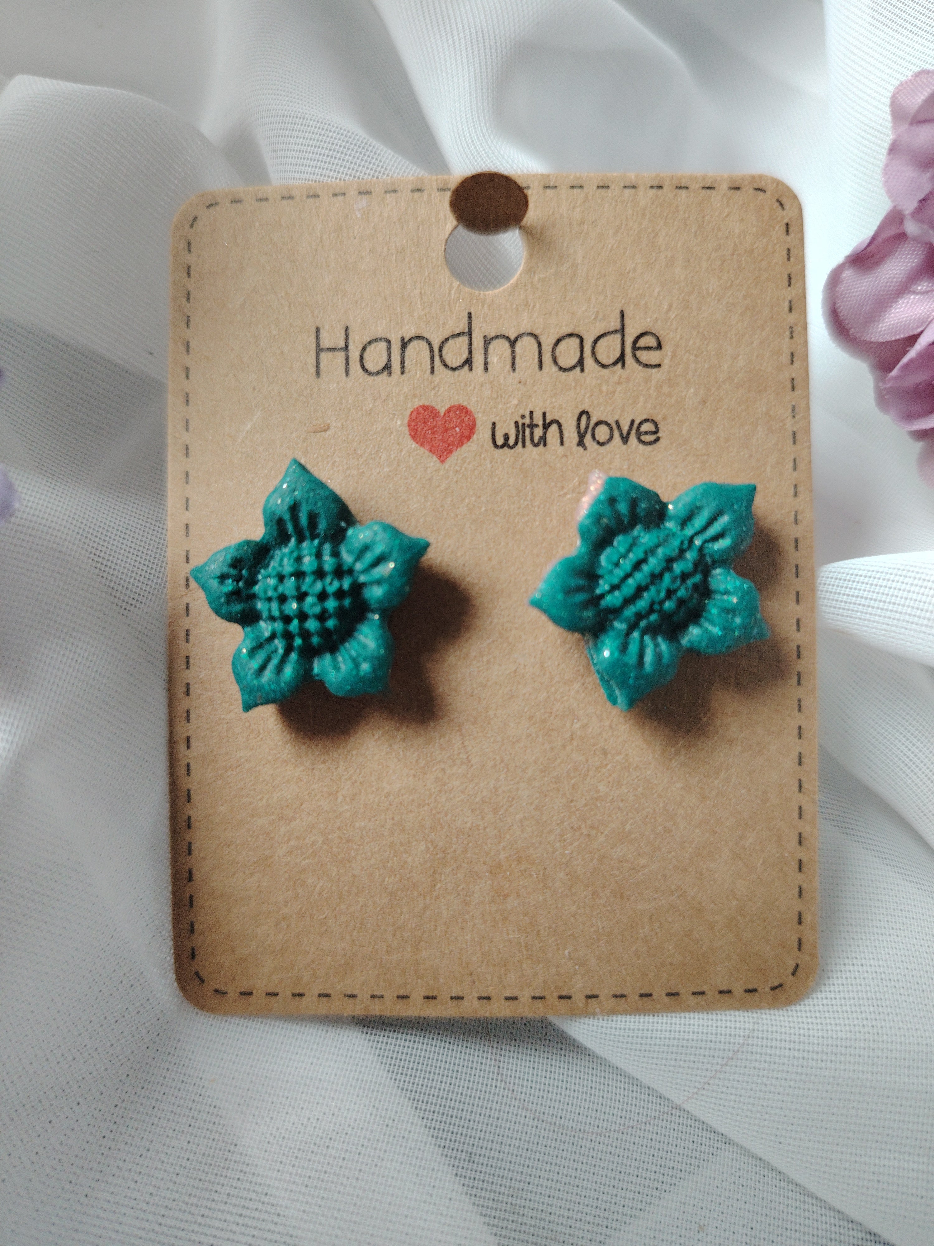 Floral earrings in green and pink glitter
