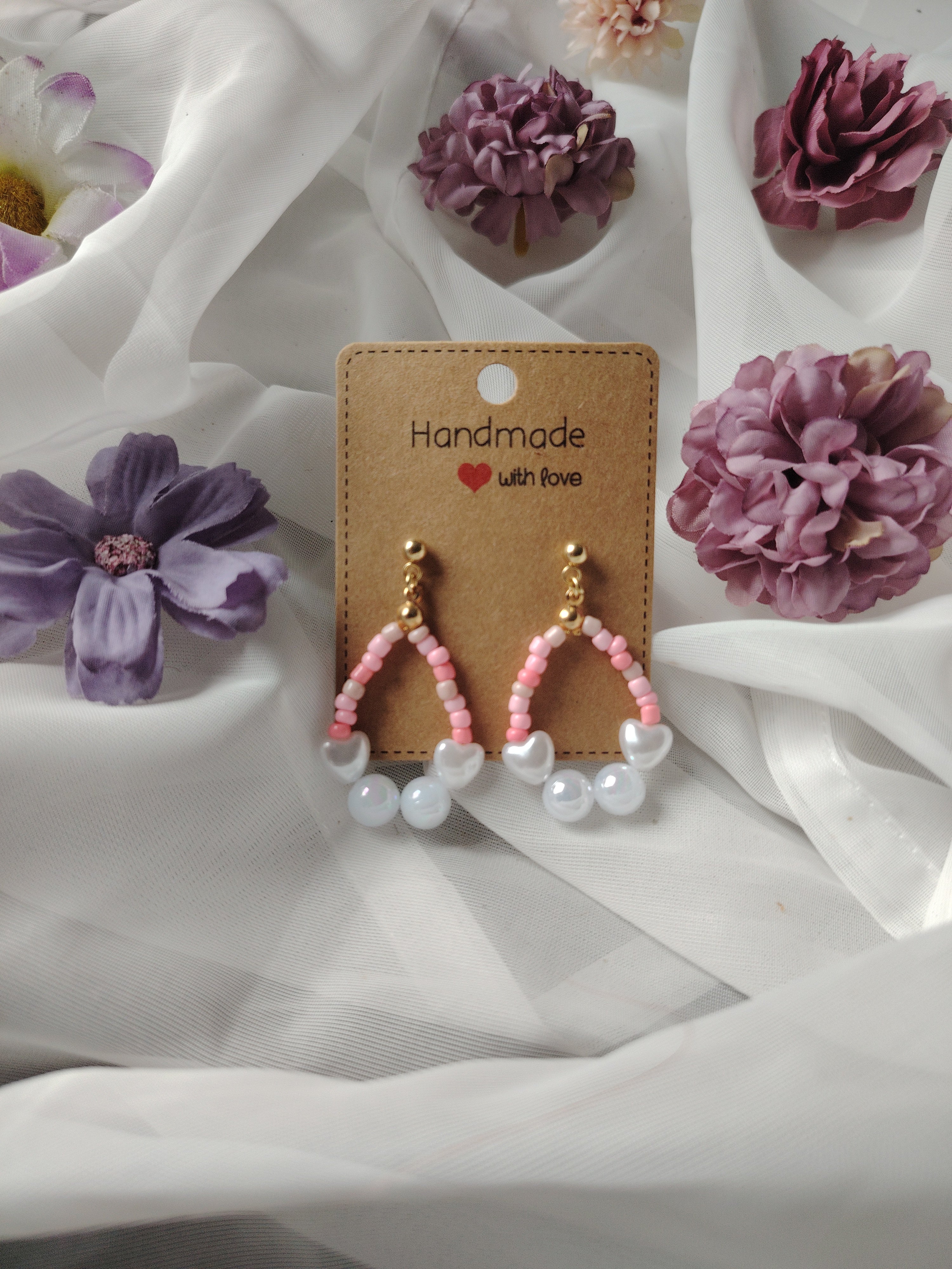 Oorbellen met kleine en grote parels in de kleuren roze, koraal, oudroze, wit zilver