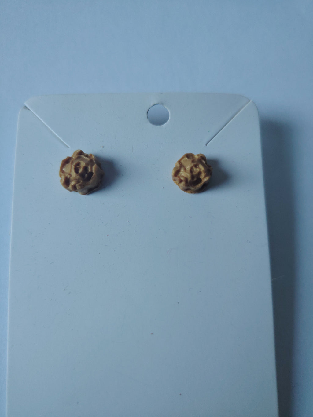Oorbellen met glinsterend goud in rooslook