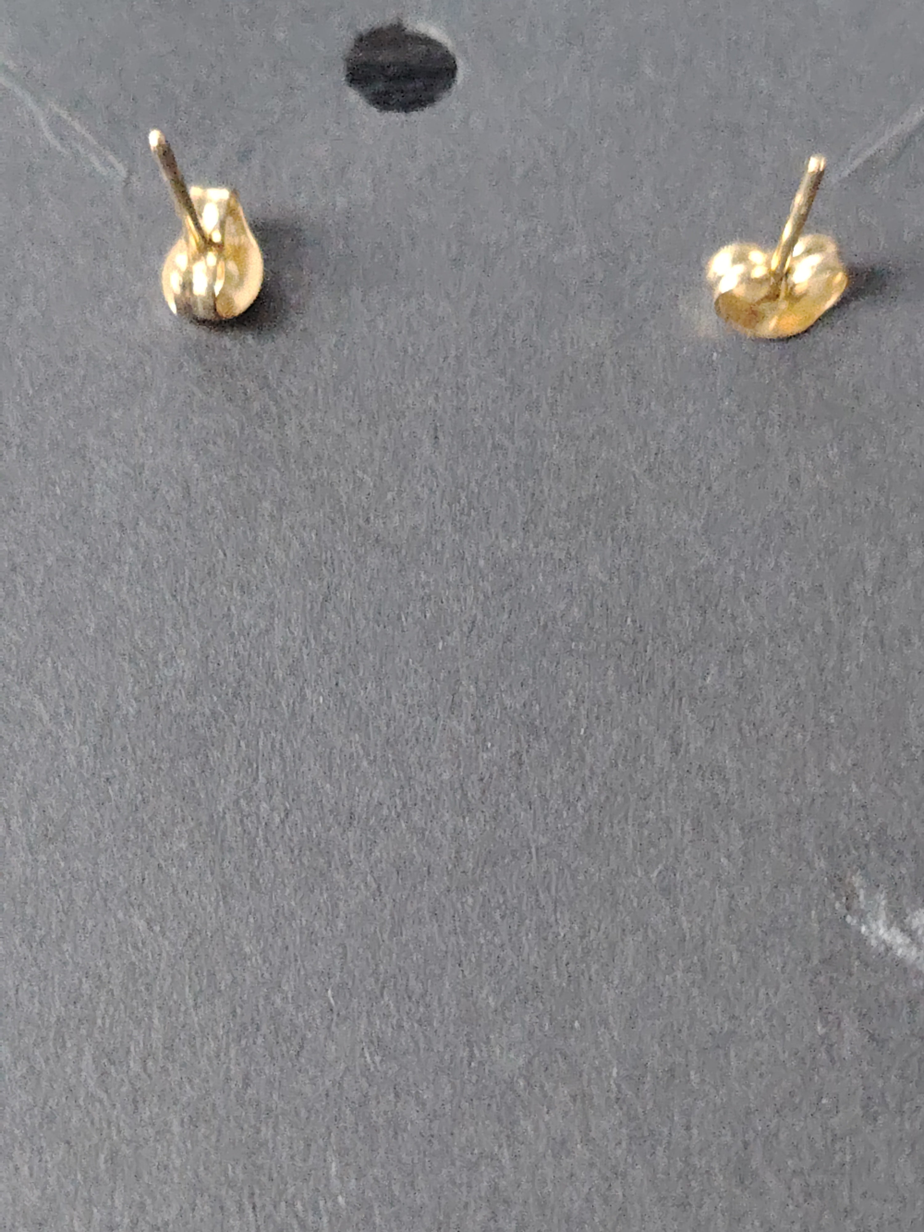 Gouden oorbellen hangers met parels en sterretjes