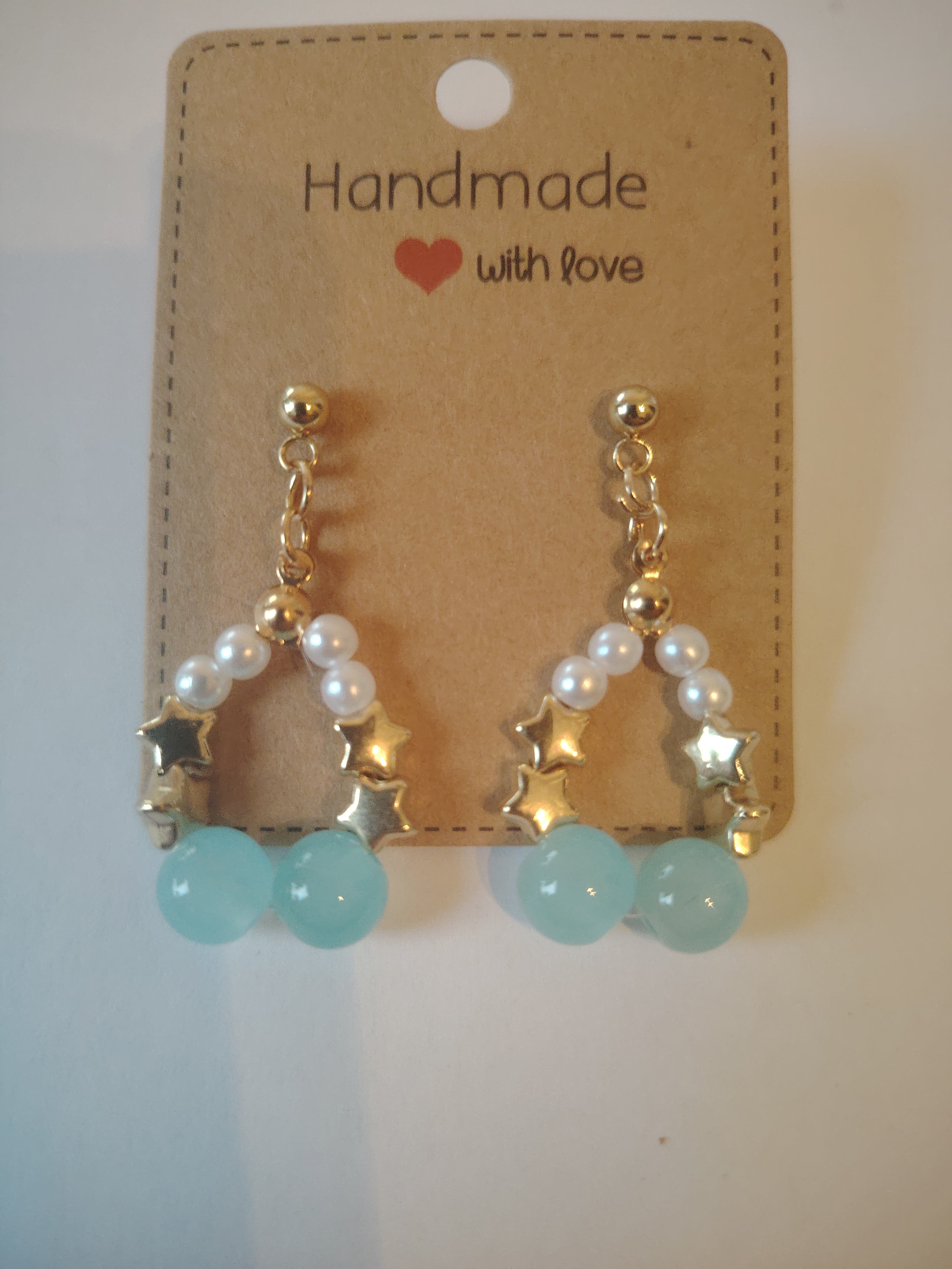 Earrings with small pearls and cute little stars with glass beads