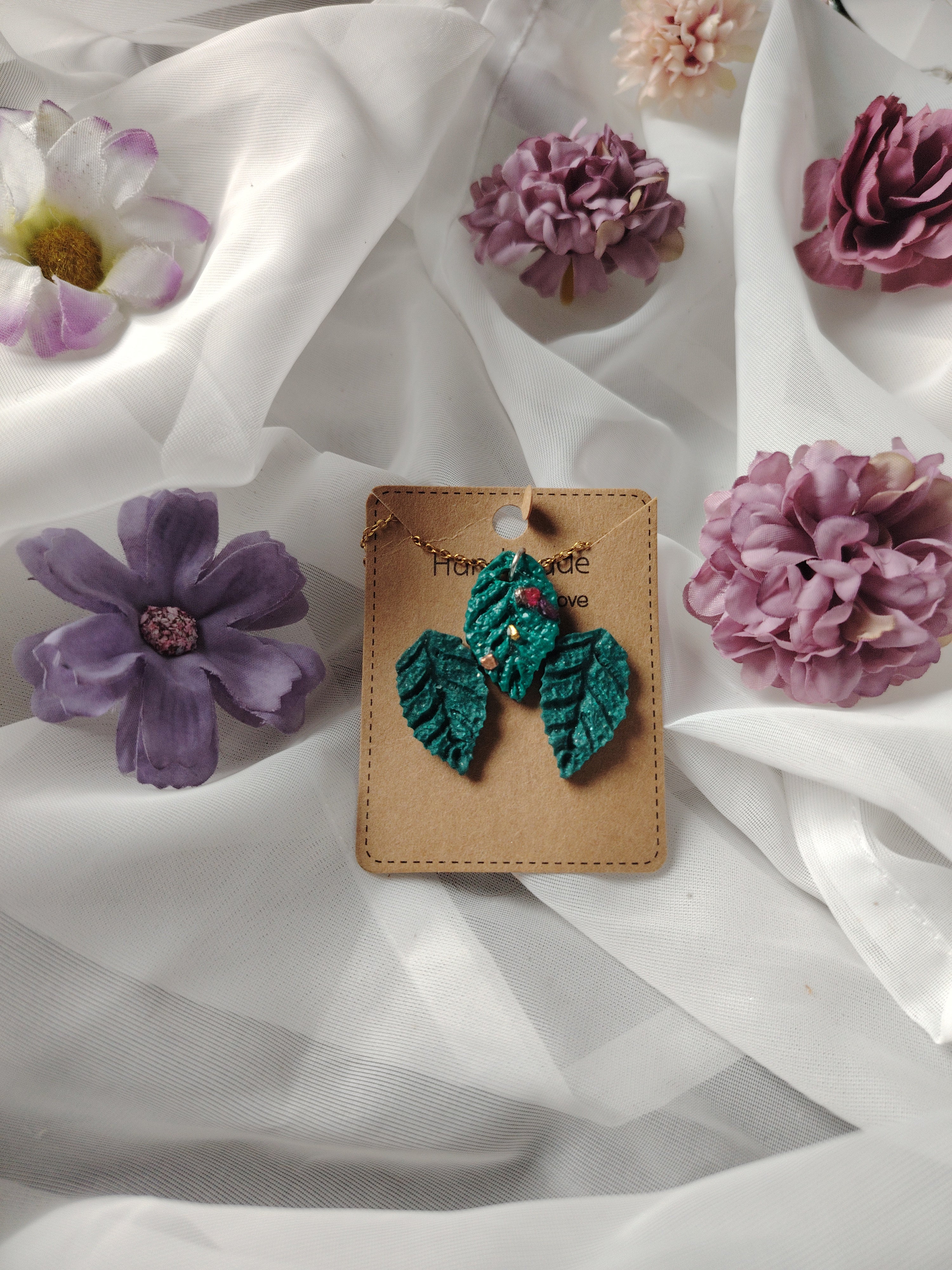 Earring and necklace set in green, necklace with small colorful stones