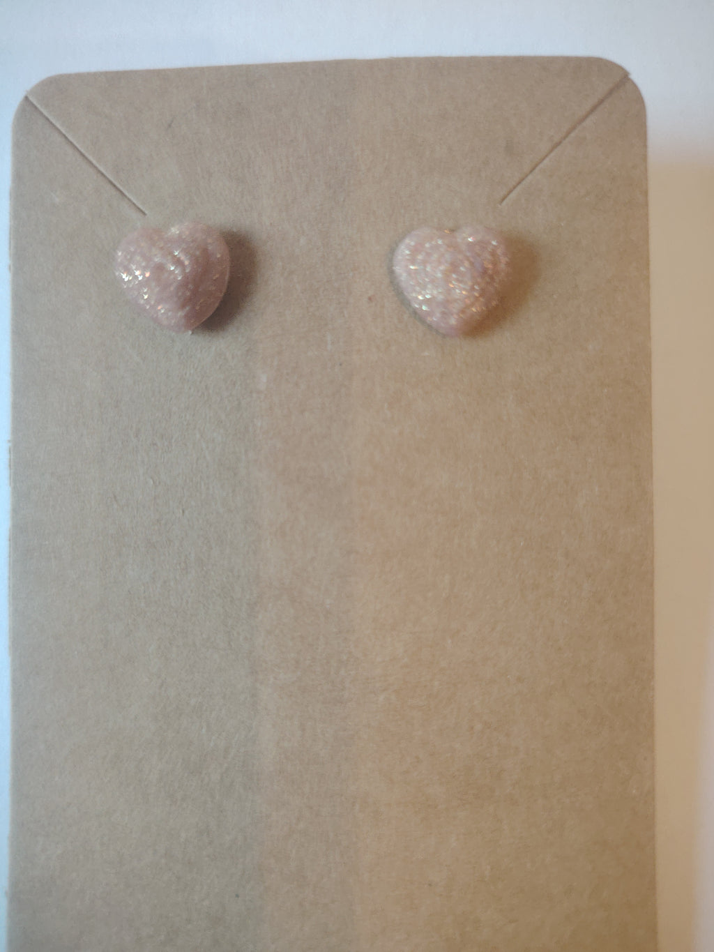 Pink glitter heart stud earrings