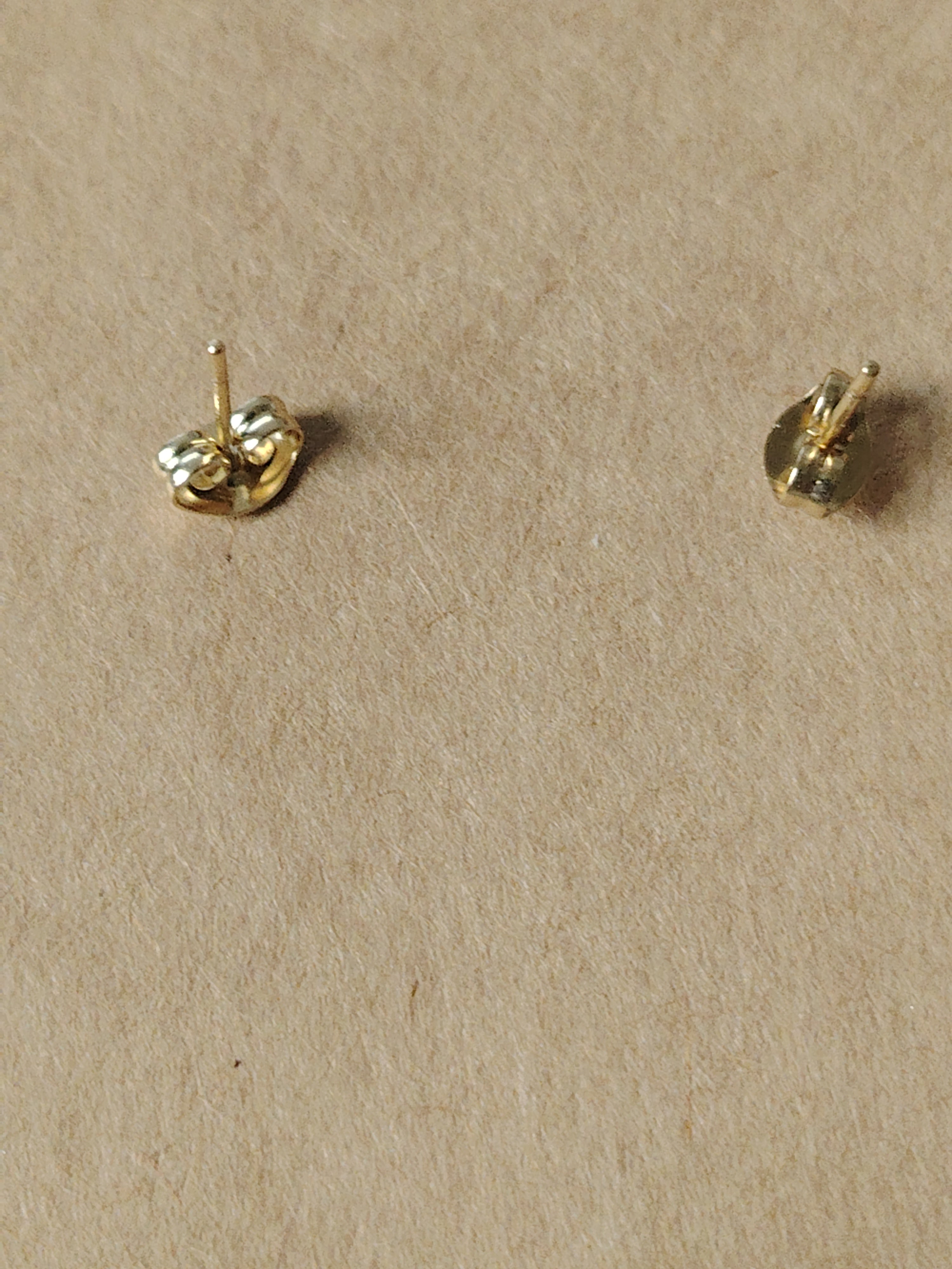 Small pink glitter rose stud earrings coated with UV resin